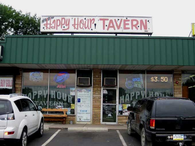 Exterior sign for Happy Hour Tavern on Veterans Highway
